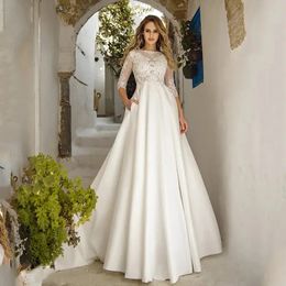 Ivory Garden Simple Satin Wedding Dresses with Pockets Lace Appliques Floor Length Sweep Train 3/4 Long Sleeves A Line Bridal Gowns Back Buttons