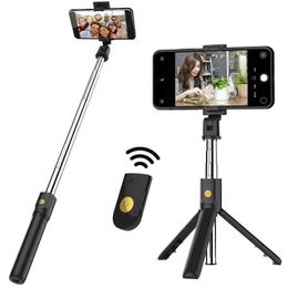 Selfie Monopods Selfie stick with a mini tripod stand equipped with a Bluetooth remote control phone holder suitable for iPhone Samsung smartphones d240522