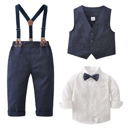 Boys Bow White Long Sleeved Shirt+Navy Vest+Navy Blue Strap Pants Fashion Gentleman Formal Suit Children's Casual Clothing L2405