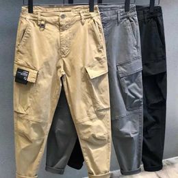 Men's Pants Beautiful fashion stickers multiple pockets mens merchandise pants new classic straight leg street casual buttons zippers Trousers Y240522