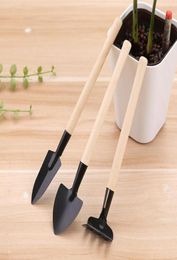 3pcsset Mini Portable Gardening Tool Wooden Handle Metal Head Shovel Rake Bonsai Tools Flowers Plants SN18221247126