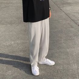 Pantaloni dritti rugosi da uomo pantaloni casual oversize maschile giapponese abbigliamento da strada pantaloni di seta sciolti pantaloni a gamba larga s-2xl 240430