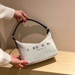 High version new French Longxiang bag bamboo section canvas bucket large tote womens bag handheld one shoulder crossbody large capacity