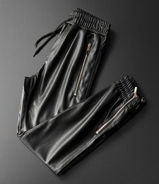 Thoshine Brand Men Leather Pants Superior Quality Elastic Waist Jogger Pants Zipper Pockets Faux Leather Trousers Pencil Pants 2015673371
