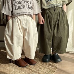 2024年春の新しい子供はズボンをゆるめる綿ファッションガールソリッドカジュアル幼児の男子用のハーレムパンツキッズ服l2405