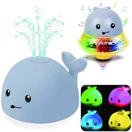 Bath Toys Cute baby light bath toy whale water sprint pool toy 2-in-1 space UFO car with fountain toy suitable for young children d240522