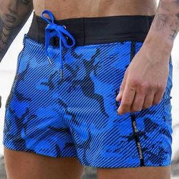 Shorts masculinos praia shorts 2023 Moda de verão de cinco pontos Camuflando as calças finas de calças casuais de secagem rápida Hawaiian calças j240522