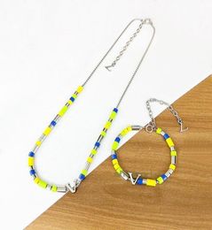 Europe America Fashion Sunrise Necklace Bracelet Men Silvercolour Metal Engraved V Letter Multicoloured Resin Hardware Beads Jewe9774809
