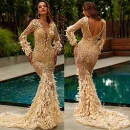 2020 Gold Mermaid Evening Dresses V Neck Appliqued Beaded Feather Long Sleeves Prom Dress Backless Ruffles Sweep Train Formal Party Gow 282h