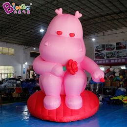 Inflatable sitting position, pink hippopotamus, pneumatic model mall opening event, prop decoration, IP cartoon cute animals