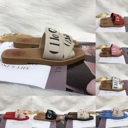 2024Woody Sandals For Womens Ladies Lettering Fabric Canvas Mules Low Heels Fashion Luxury Ladies Summer Casual Shoes Slippers chioe Wood Slide