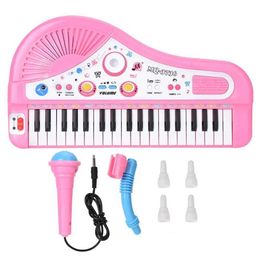 Keyboards Piano Baby Music Sound Toys Cute pink 37 key keyboard with microphone digital electronic charging WX5.21526652