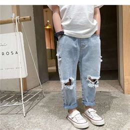 Barn pojkar sommar rippade ny mode barn baby lös casual jeans byxor pojke och tjejbyxor l2405