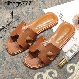 Designer Fashion Oran Sandals Slipper Handmade Togo Leather Womens Palm Wax Line Flat Bottom Leather Beach