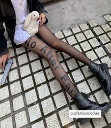 Black English letter silk stockings net red ins fashionable black silk pantyhose girl6787689