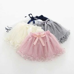 Skirts Skirts 2021 Baby Girl Tutu Skiing Pearl Short Cake Preschool Girl Skiing Childrens Bow Princess Wave Pink Fluffy Sheep Skiing Ballet Dance Children WX5.21