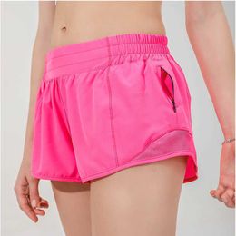 091-Hot Low Rise Shorts Breattable Quick-Dry Yoga Inbyggd fodrad sport kort dold blixtlås sido-droppfickor som kör svettbyxor med kontinuerlig dragkord 3R3s