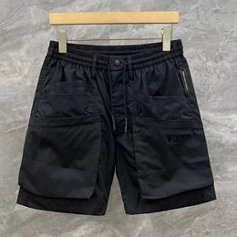 Men's Shorts Mens Clothing Trendy Multi-Pocket Elastic Waist Summer New Loose Functional Casual Workwear Versatile Shorts Five-Quarter Pants J240522