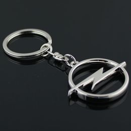 5pcs lot Fashion Metal 3D Car Logo Keychain Key Chain Keyring Key Ring Chaveiro Llavero For Opel Auto Pendant Car Accessories Wholesale 298s