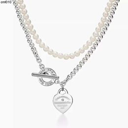 Popular Temperament t Family Sterling Silver Ot Buckle Double Layer Pearl Heart Shaped Pendant with Diamond Necklace for Women Wqru