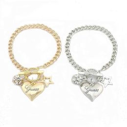 Bangle Hot selling womens heart-shaped charm gold and silver bracelet jewelry in 2024 European American gifts Q240522