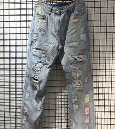 Mens Streetwear Ripped Jeans High Damage Boot Cut Denim Pants with 3d Letter Print and Metal Button Zipper Closurefqls