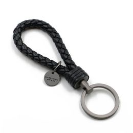 Leather car key chain Mens high quality key chain pendant cowhide hand woven womens creative gift decorative key chain lanyard 240522