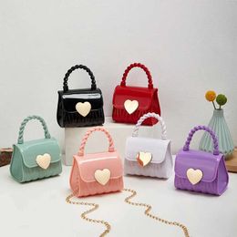 Handbags New Solid Color Fresh Sweet Love Chain Mini PVC Jelly Womens Bag Fashion Ten Font Lipstick Small Bag Y240523