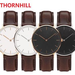 Japan Quartz Movement Classic Designer Watches Mens 40mm Womens 36mm Genuine Leather Top Quality Wristwatches Gift With Original Box Mo 265b