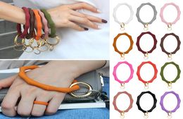 Keychains Big O Silicone Loop Wrist Key Ring Keychain With Gold Clasp Round Strap Accessories Whole Women Bag SuppliesKeychain1136352