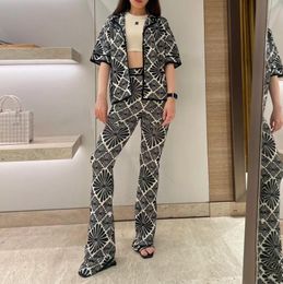 2024 Summer French Sa * ndro Leisure Vacation Style Print Pattern Flip Collar Knitted Top+Micro Flared Pants Set