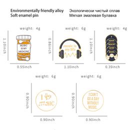 Creative alloy letter brooch earphones with magnetic tape shape, baked paint badge, clothing accessories