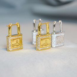 Western Viviane Westwood Empress Dowagers High Version Lock Head Saturn Earring Style Three Dimensional Lock Head Earrings With A High Level Sense