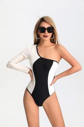 Women's summer one-piece sports swimsuit solid color conservative surf suit Stenciled Long sleeve one-piece sexy slim-fit polyamide women's swimsuit