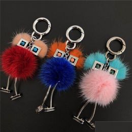 Keychains Lanyards Genuine Real Fur Chick Monster Robot Doll Toy Charm Pompom Ball Bag Key Chain Keyring Car Phone Accessories Drop De Otmyw