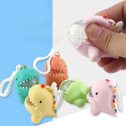 Decompression Toy TPR cartoon dinosaur water polo pink music cartoon soft rubber keychain vent ball designed to relieve stress as a childrens