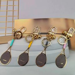 Simple And Cute High-End Key Chain Mesh Racket Delicate Bag Pendant Decoration New Couple Fashion Letter Logo High Appearance Level Car Key Chain 2024