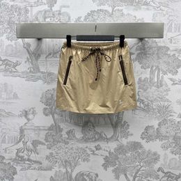 Юбки дизайнерский бренд Nanyou Miu тонкий западный стиль возраст, уменьшающий повседневные дышащие карманные буквы контрастной шнурки короткая юбка 42US