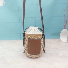 Designer woven bag 2024 Luxury Handbag Paper Grass Woven Single Shoulder Crossbody Handheld Womens Straw Woven Bag Tourism Photography Bucket Factory Sale Top 7A