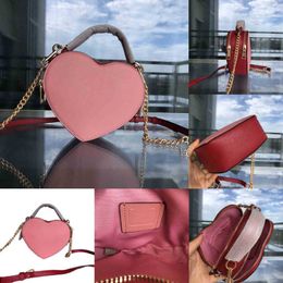 Evening Bags High Quality Women Designers Bags Handbags Clutch Purses Casual Shoulder Heart-shaped Clutches Ladies Fashion Bags 0525 294T