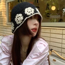 Korean Niche Designer Hand-knitted Bucket Hat Spring and Summer Hollow Woven Flower Basin Cap Show Small Face Retro Womens Hats 240520
