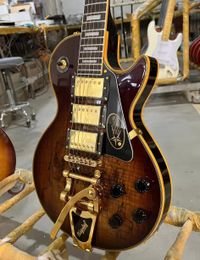 Custom electric guitar, 6-string guitar, mahogany body, Decayed Maple Top, Mahogany fingerboard, Tremolo system, 258