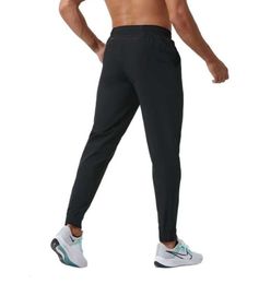 2024 Yoga Pants Mens Jogger Long Pants Sport outfit snabb torrt dragkampgymfickor Sweatpants Byxor Casual Elastic Midje Fitness 1152ESS