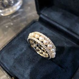 Topp fransk designer naturlig pärla diamantring för kvinnor 925 sterling silver lyxig minoritet design ihålig avancerad känsla elegant nåd aedx