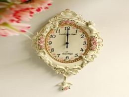 European Garden Ornament luxury watch clock Home Furnishing resin relief angel living room wall clock6341821