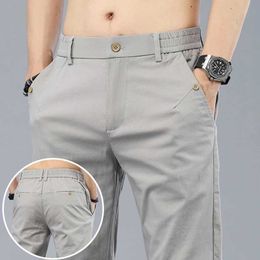 Men's Pants 2024 New Mens Classic Korean Solid Summer 3-Color Casual Pants Business Fashion Elastic Cotton Ultra Thin Brand Mens Trousers Q240525