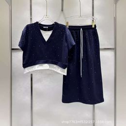 여자 정장 블레이저스 SS24 여름 가짜 2 조각 짧은 Tophip Wrap Half Skirt Western Leisure Set