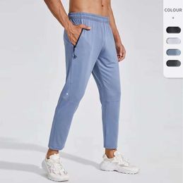 Lu l designer ll mens jogger długie spodnie sportowe strój jogi Szybki suchy sznurka gym kieszenie dresowe spodnie spodni swobodny elastyczna talia moda 2285ess