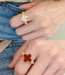 Fashion designer Four-leaf 18k gold clovers Rings Stainless steel luxury Kaleidoscope Red agate Ring for women Female Minority Simple C Achk