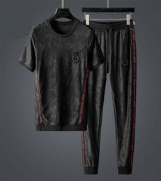 High end luxury leisure sports suit men s summer loose Korean trend set of clothes T shirt short sleeve trousers two piece 2206155537013